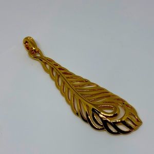 Feather pendant, brand new